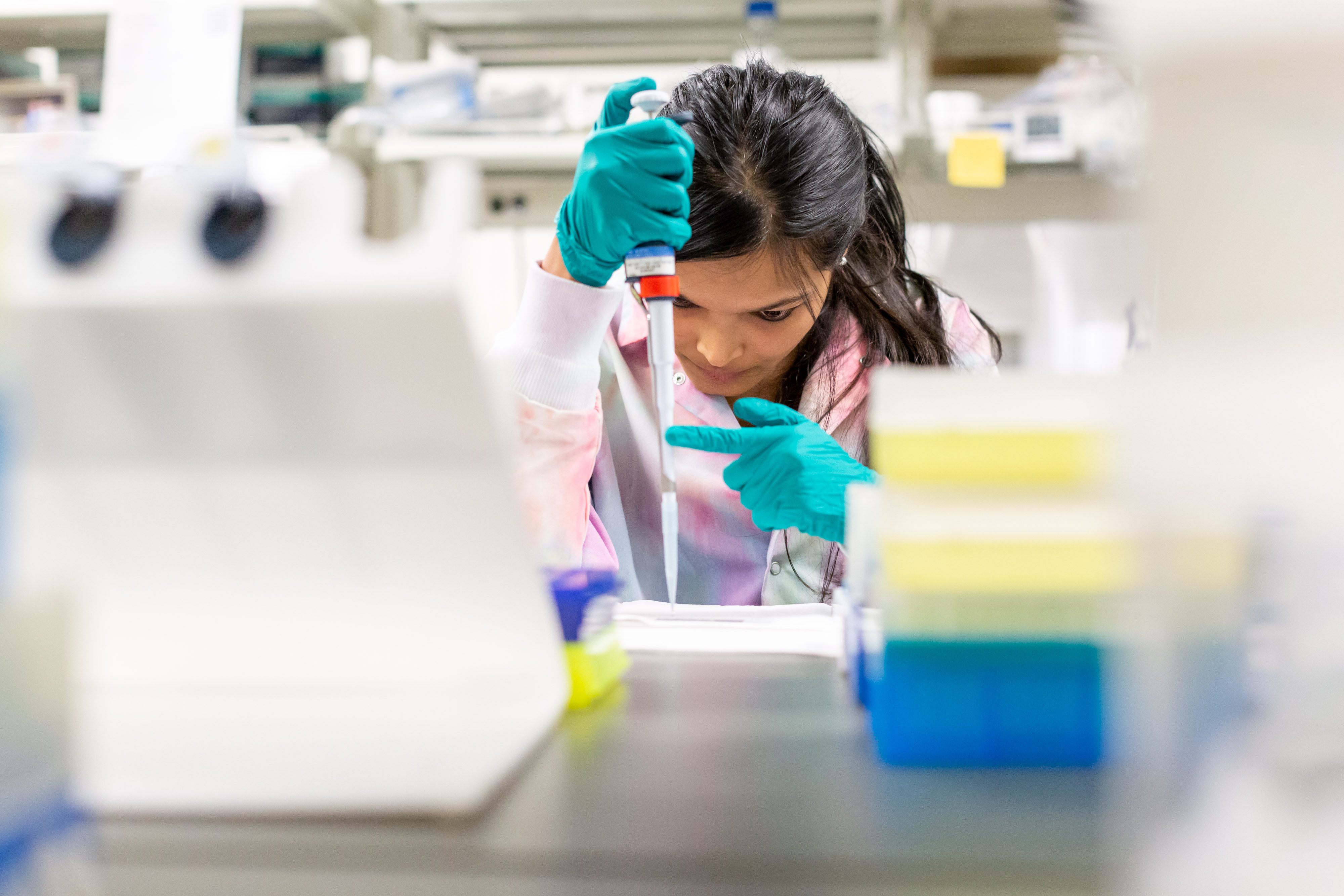Student deposits material with pipette
